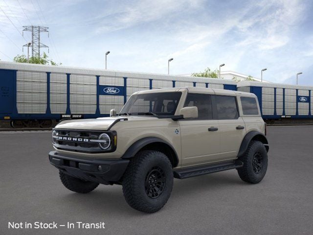 2026 Ford Bronco Outer Banks in Desert Sand — front three-quarter view