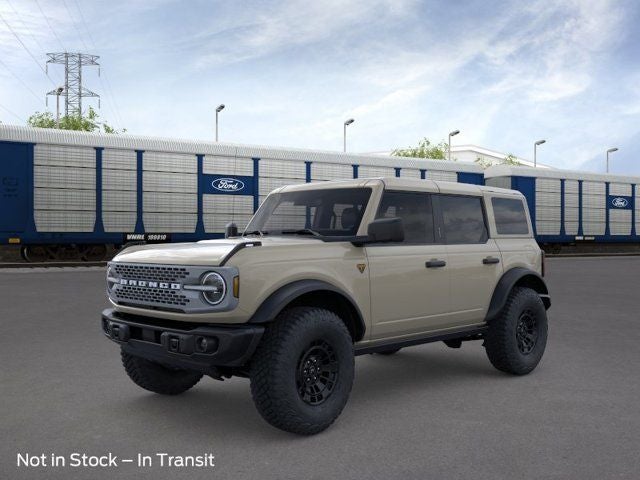 2026 Ford Bronco Badlands in Desert Sand — front three-quarter view