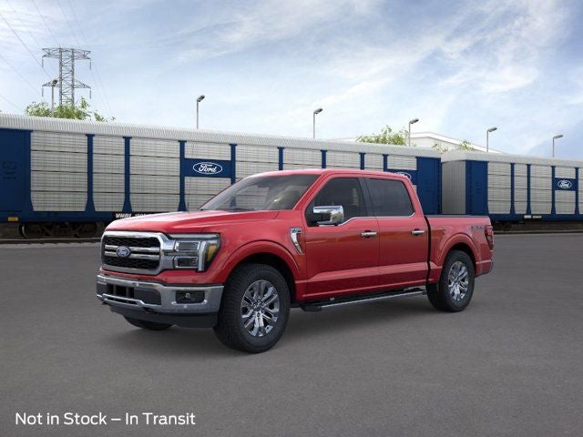 2026 Ford F-150 Lariat in Ruby Red Metallic — front three-quarter view