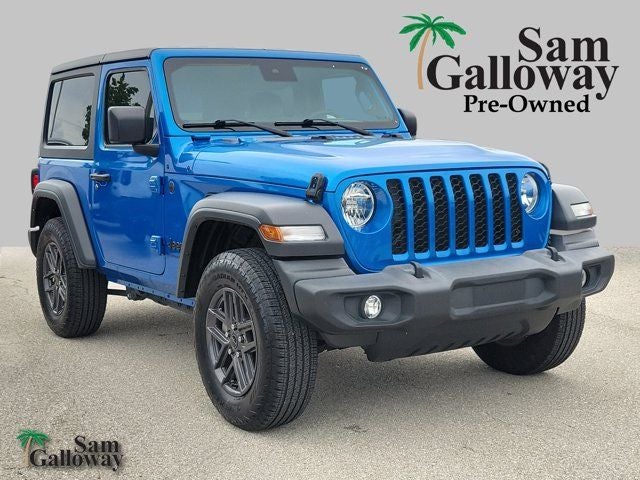 2024 Jeep Wrangler Sport S in Blue Pearl — front three-quarter view