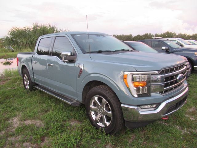 2023 Ford F-150 Lariat in Blue — front three-quarter view